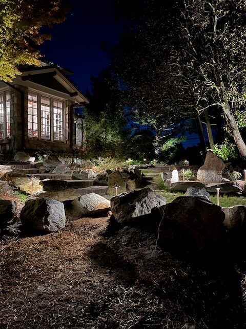 Custom outdoor landscape lighting installation on a Greenville, SC home
